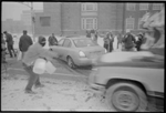 [PICTURE - car ploughs through people and banner]