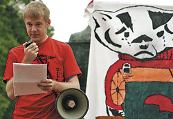 UW-Madison sophomore John Bruning speaks out against sweat shops at a rally outside Bascom Hall Wednesday afternoon.
