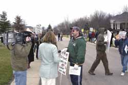 [PICTURE -WISC-TV (the CBS affiliate) interviews a striking Tyson worker ]