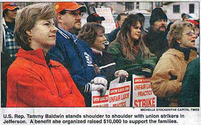 [Tammy Baldwin  stands with strikers]